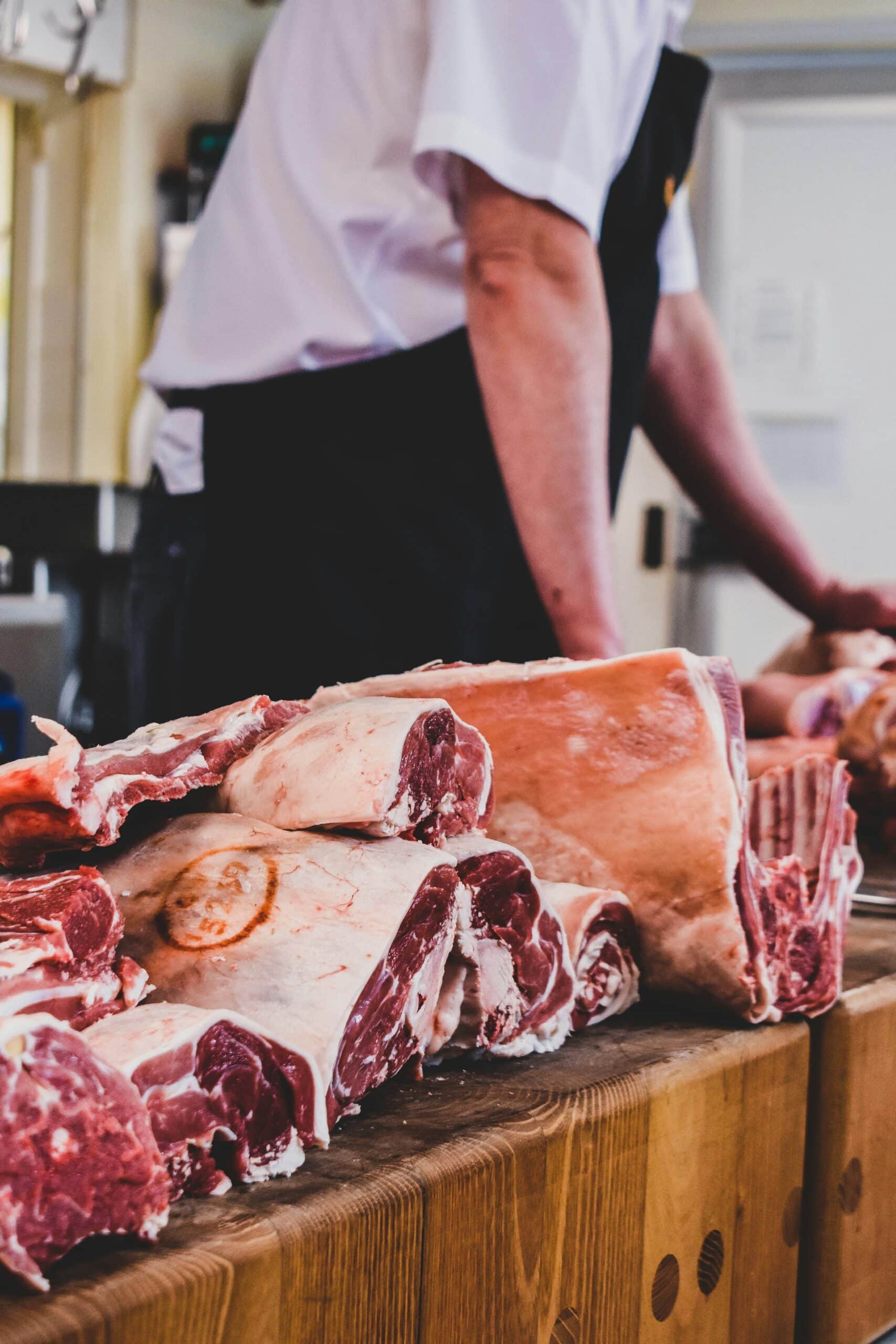 High-quality beef cuts displayed on a butcher's counter for professional chefs and meat enthusiasts.